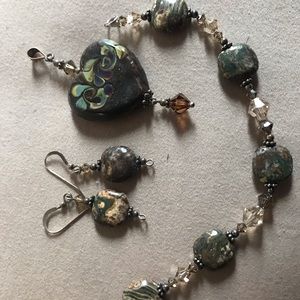 Bracelet, earrings and heart charm